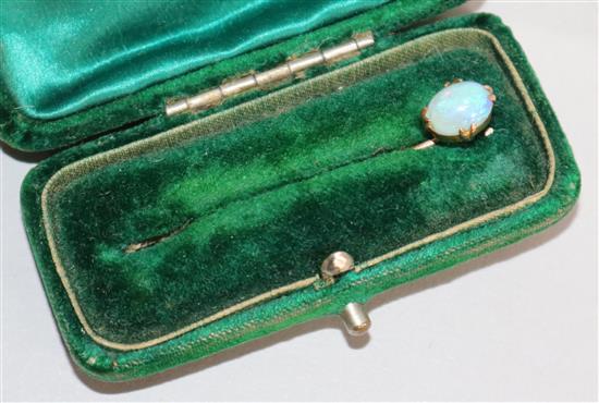 A Victorian gold and opal stick pin, 2.25in.